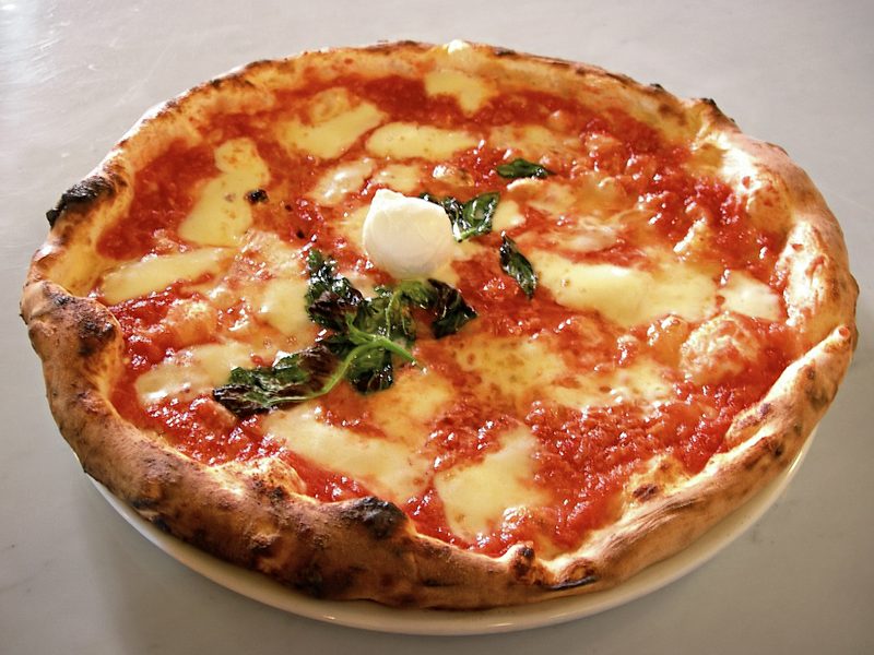 Neapolitan pizza with San Marzano tomato, buffalo mozzarella and fresh basil